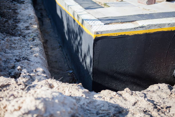 Professional Waterproofing technician working in Chevy Chase, MD